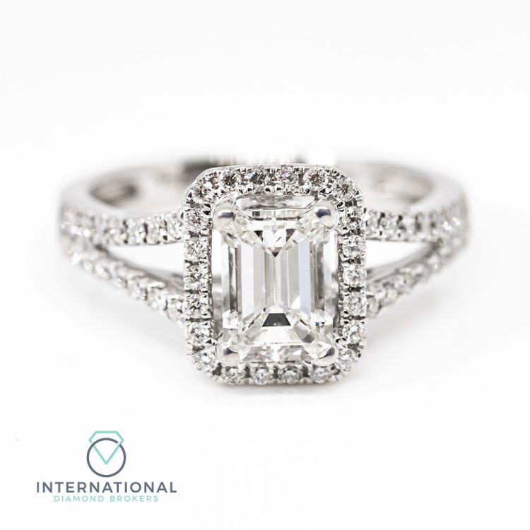 18ct White Gold & 1.35ct Emerald Cut Diamond Halo Engagement Ring